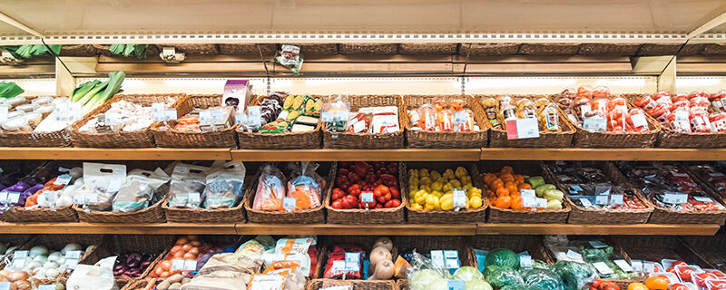 Fresh vegetables on shelf in supermarket Fresh vegetables on refrigerator shelf in supermarket